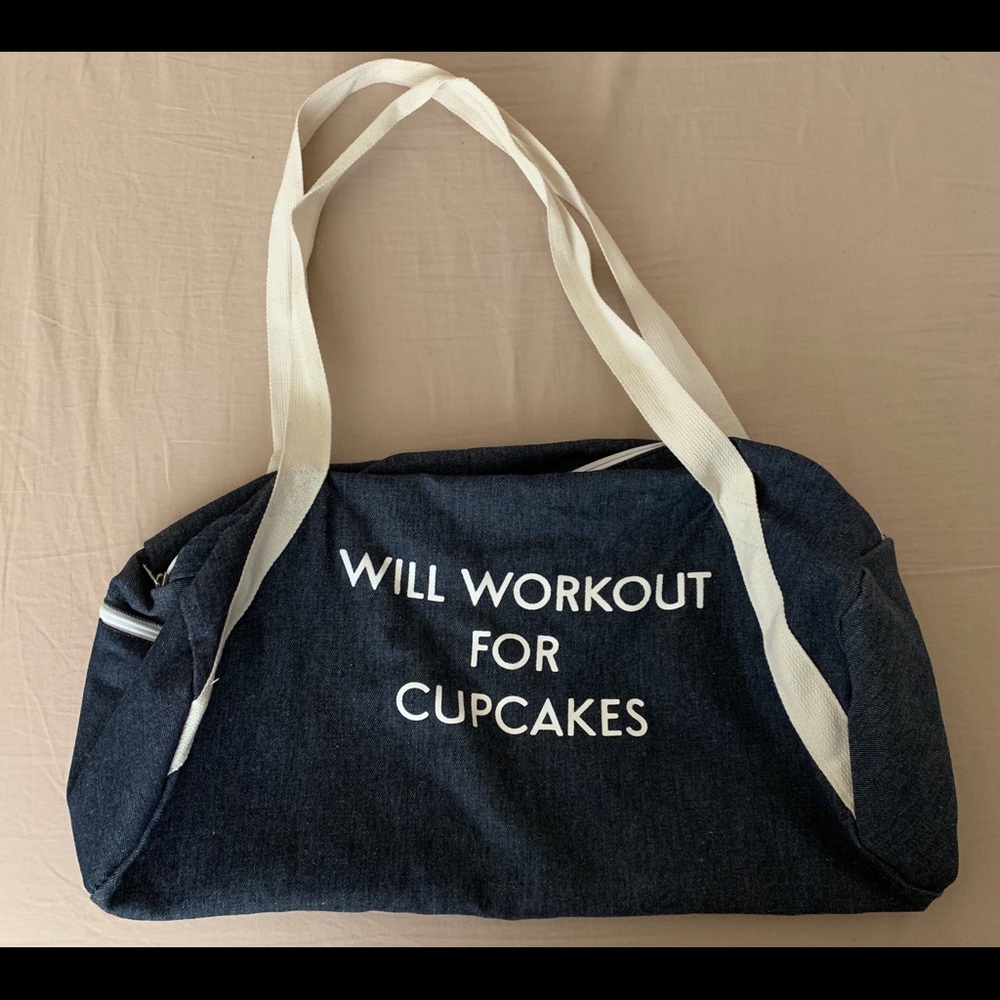 Will Workout for Cupcakes” denim duffel bag.